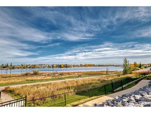 101-380 Marina Drive, Chestermere, AB - Outdoor With Body Of Water With View