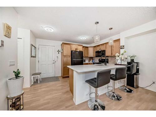 101-380 Marina Drive, Chestermere, AB - Indoor Photo Showing Kitchen