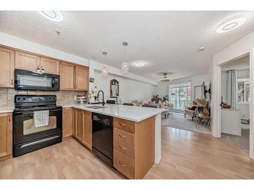 101-380 Marina Drive, Chestermere, AB - Indoor Photo Showing Kitchen