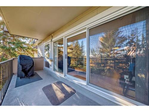 204-328 Cedar Crescent Sw, Calgary, AB - Outdoor With Balcony With Deck Patio Veranda With Exterior