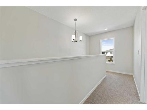 119 Dawson Wharf Rise, Chestermere, AB - Indoor Photo Showing Other Room