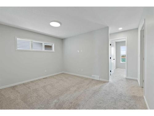 119 Dawson Wharf Rise, Chestermere, AB - Indoor Photo Showing Other Room