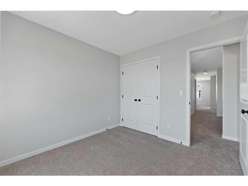 119 Dawson Wharf Rise, Chestermere, AB - Indoor Photo Showing Other Room