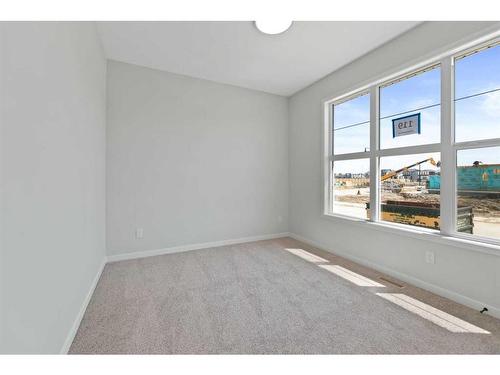 119 Dawson Wharf Rise, Chestermere, AB - Indoor Photo Showing Other Room