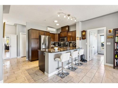 303-35 Inglewood Park Se, Calgary, AB - Indoor Photo Showing Kitchen With Stainless Steel Kitchen With Upgraded Kitchen