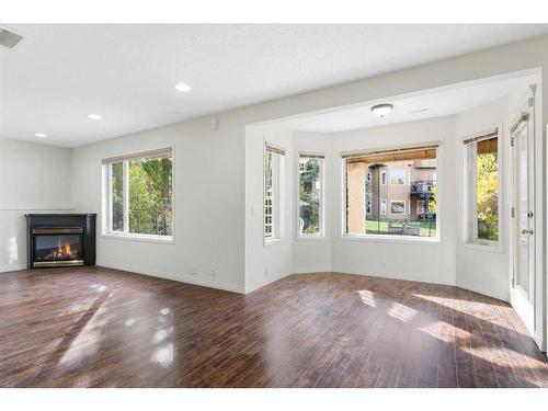 3186 Signal Hill Drive Sw, Calgary, AB - Indoor Photo Showing Living Room With Fireplace