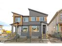 459 Tekarra Drive Nw, Calgary, AB  - Outdoor With Facade 