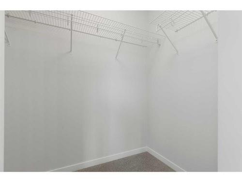 459 Tekarra Drive Nw, Calgary, AB - Indoor With Storage