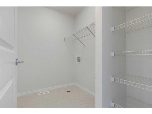 459 Tekarra Drive Nw, Calgary, AB - Indoor With Storage