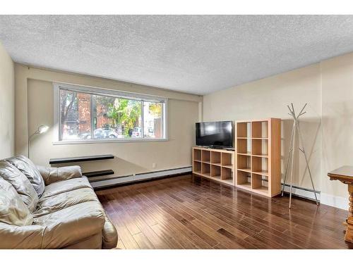 102-525 22 Avenue Sw, Calgary, AB - Indoor Photo Showing Living Room