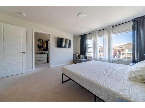 60 Wolf Creek Street Se, Calgary, AB - Indoor Photo Showing Bedroom