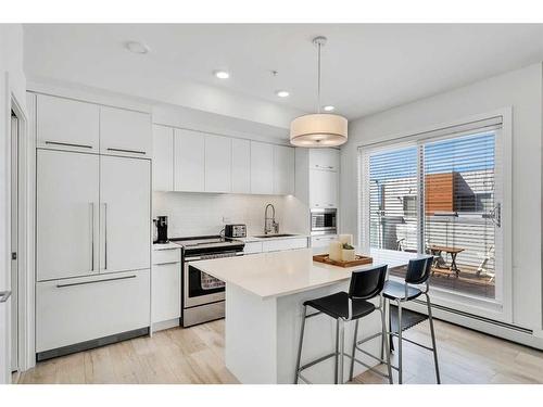 407-3125 39 Street Nw, Calgary, AB - Indoor Photo Showing Kitchen With Stainless Steel Kitchen With Upgraded Kitchen