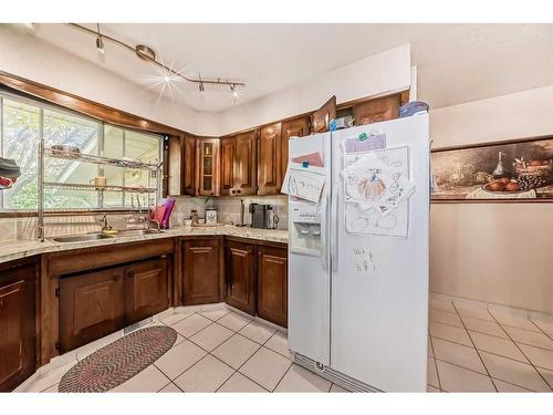 5044 Dalhart Road Nw, Calgary, AB - Indoor Photo Showing Kitchen With Double Sink