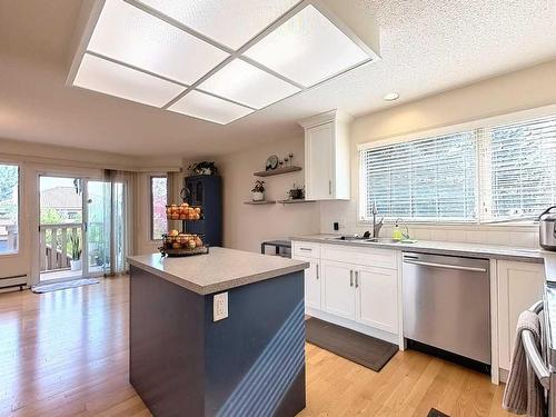 217 Sirocco Place Sw, Calgary, AB - Indoor Photo Showing Kitchen With Double Sink