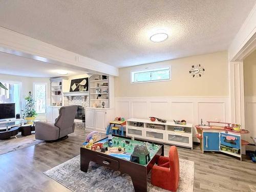 217 Sirocco Place Sw, Calgary, AB - Indoor With Fireplace