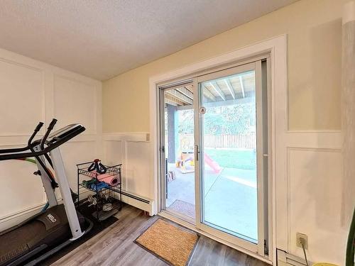 217 Sirocco Place Sw, Calgary, AB - Indoor Photo Showing Gym Room