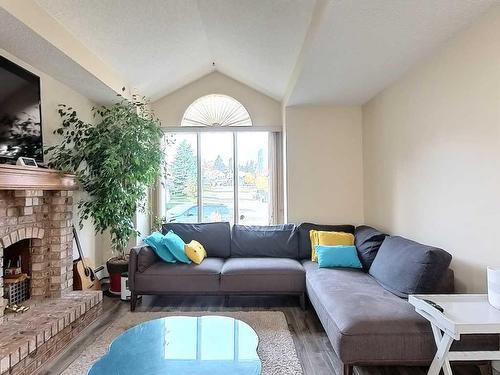 217 Sirocco Place Sw, Calgary, AB - Indoor Photo Showing Living Room With Fireplace