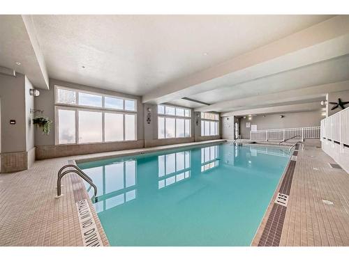 108-15 Everstone Drive Sw, Calgary, AB - Indoor Photo Showing Other Room With In Ground Pool