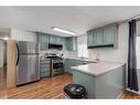 17 Spring Haven Close Se, Airdrie, AB  - Indoor Photo Showing Kitchen With Stainless Steel Kitchen With Upgraded Kitchen 