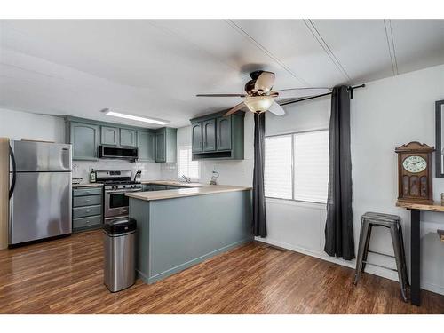 17 Spring Haven Close Se, Airdrie, AB - Indoor Photo Showing Kitchen With Stainless Steel Kitchen