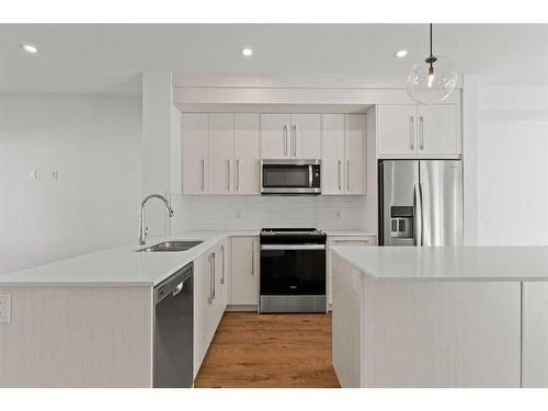 2002-280 Chelsea Road, Chestermere, AB - Indoor Photo Showing Kitchen With Upgraded Kitchen