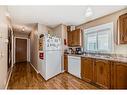 148 Hunterhorn Drive Ne, Calgary, AB  - Indoor Photo Showing Kitchen With Double Sink 