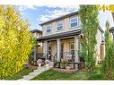 7 Reunion Grove Nw, Airdrie, AB  - Outdoor With Deck Patio Veranda With Facade 