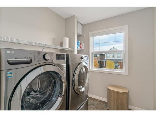 7 Reunion Grove Nw, Airdrie, AB - Indoor Photo Showing Laundry Room