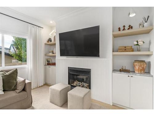 7 Reunion Grove Nw, Airdrie, AB - Indoor Photo Showing Living Room With Fireplace