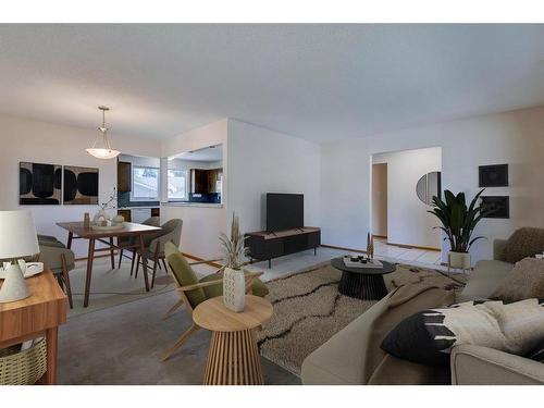 203 Lynnover Place Se, Calgary, AB - Indoor Photo Showing Living Room