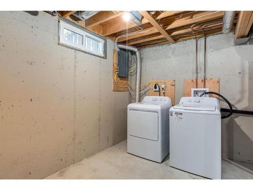 117-6440 4 Street Nw, Calgary, AB - Indoor Photo Showing Laundry Room