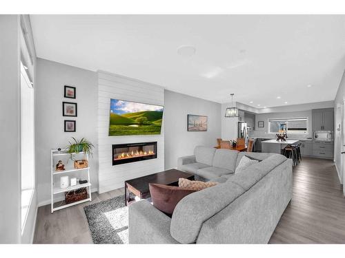 139 Howse Crescent Ne, Calgary, AB - Indoor Photo Showing Living Room With Fireplace