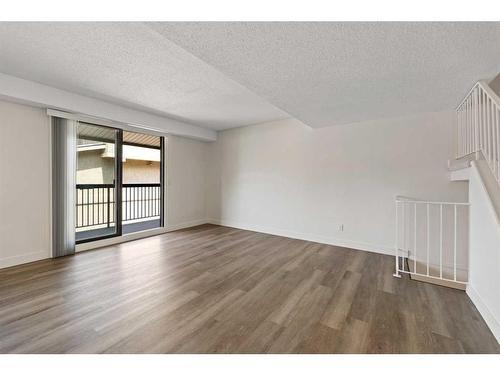 1003-2200 Woodview Drive Sw, Calgary, AB - Indoor Photo Showing Other Room