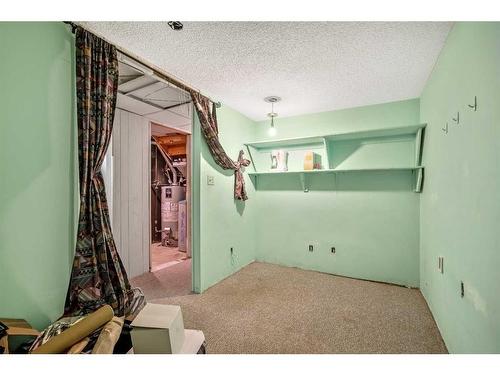 100 Castlegrove Road Ne, Calgary, AB - Indoor Photo Showing Other Room