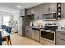 1107-350 Livingston Common Ne, Calgary, AB  - Indoor Photo Showing Kitchen With Upgraded Kitchen 