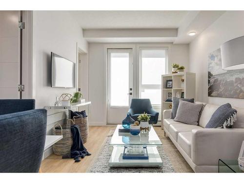 1107-350 Livingston Common Ne, Calgary, AB - Indoor Photo Showing Living Room