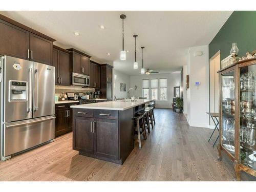 173 Willow Street, Cochrane, AB - Indoor Photo Showing Kitchen With Stainless Steel Kitchen With Upgraded Kitchen