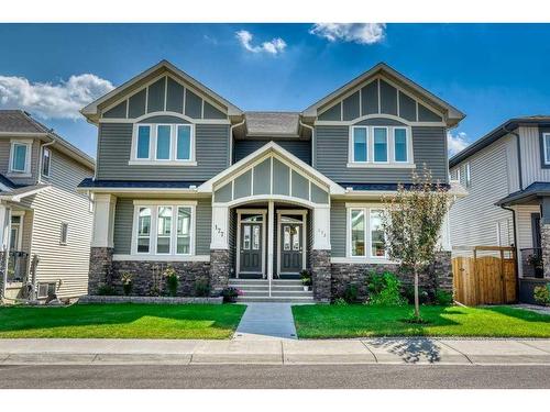 173 Willow Street, Cochrane, AB - Outdoor With Facade