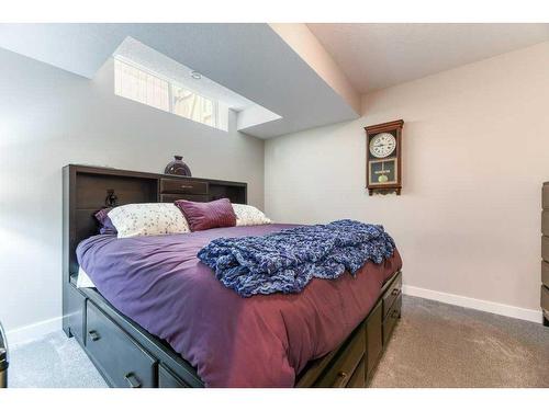 173 Willow Street, Cochrane, AB - Indoor Photo Showing Bedroom