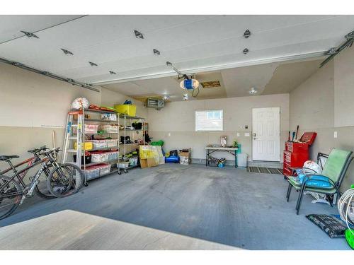 173 Willow Street, Cochrane, AB - Indoor Photo Showing Garage