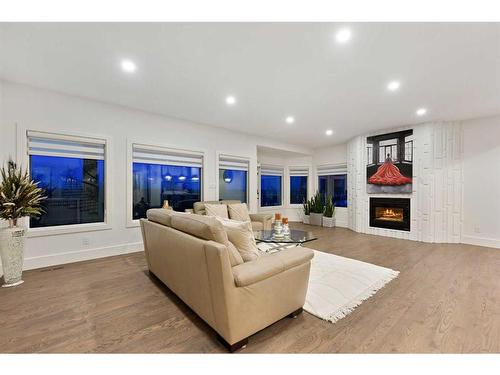 108 Patterson Drive Sw, Calgary, AB - Indoor Photo Showing Living Room With Fireplace