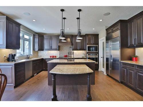 66 Silverado Ranch Way Sw, Calgary, AB - Indoor Photo Showing Kitchen With Stainless Steel Kitchen With Upgraded Kitchen