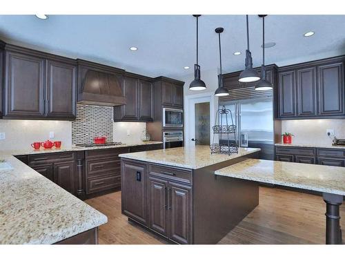 66 Silverado Ranch Way Sw, Calgary, AB - Indoor Photo Showing Kitchen With Upgraded Kitchen