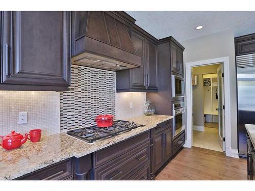 66 Silverado Ranch Way Sw, Calgary, AB - Indoor Photo Showing Kitchen With Upgraded Kitchen