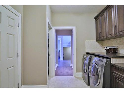 66 Silverado Ranch Way Sw, Calgary, AB - Indoor Photo Showing Laundry Room