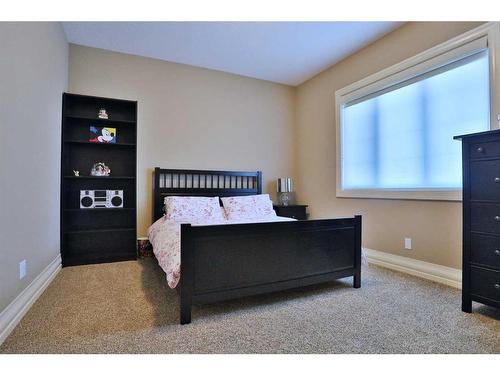 66 Silverado Ranch Way Sw, Calgary, AB - Indoor Photo Showing Bedroom