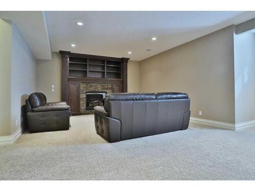 66 Silverado Ranch Way Sw, Calgary, AB - Indoor With Fireplace