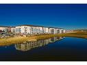 3415-298 Sage Meadows Park Nw, Calgary, AB  - Outdoor With Body Of Water With View 