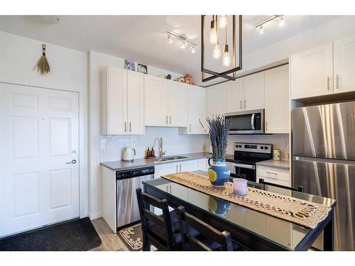 3415-298 Sage Meadows Park Nw, Calgary, AB - Indoor Photo Showing Kitchen With Stainless Steel Kitchen