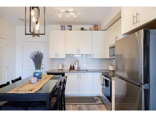 3415-298 Sage Meadows Park Nw, Calgary, AB - Indoor Photo Showing Kitchen With Stainless Steel Kitchen With Upgraded Kitchen